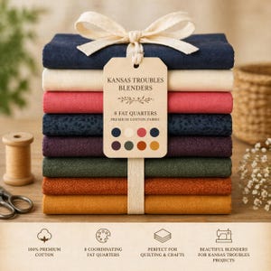 May include: A stack of eight fat quarters in various colors, tied with a cream ribbon. The fabric bundle includes a tag that reads "Kansas Troubles Blenders" and "8 Fat Quarters Premium Cotton Fabric." The image also shows a wooden spool, scissors, and text that reads "100% Premium Cotton."