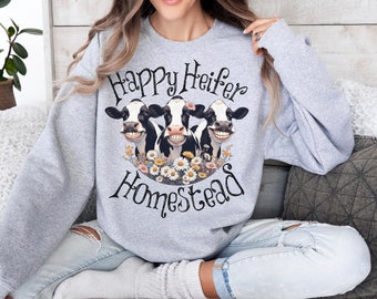 Happy Heifers Homestead Unisex Heavy Blend Crewneck Sweatshirt, smiling herd Holstein cows, charming animal top, wildflowers on a dairy farm