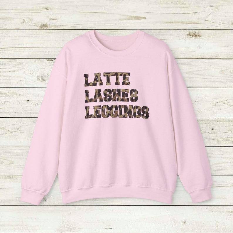 Latte Lashes Leggings Sweatshirt, Crewneck Unisex, Trendy Leopard print chic women's style, eyelashes coffee comfy clothes, daily wear tee Light Pink