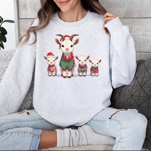 Merry Goats Unisex Crewneck Sweatshirt, Christmas party barnyard farm,hats and ugly christmas knit sweaters, cute animals winter themed image 1