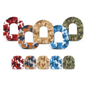 May include: A collection of camouflage-patterned, arched shapes in red, orange, tan, blue, and green. The designs are repeated in a smaller row below. The shapes have a cutout in the center.