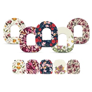 May include: A selection of floral patterned adhesive patches. The patches are in a rounded rectangle shape with a central cutout. Designs feature flowers, leaves, and vines in red, pink, and green. The patches are designed for medical use.