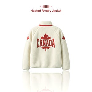 May include: An off-white fleece jacket featuring a red maple leaf and the text CANADA on the back. The jacket has a high collar with red trim, long sleeves with small red maple leaf accents, and the text Heated Rivalry Jacket above it.