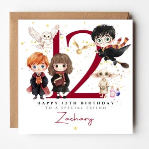 May include: A birthday card featuring illustrations of characters from a fantasy series. The card includes the number 12 in burgundy, the text "Happy 12th Birthday to a special friend" and a name. The card is on a brown envelope.
