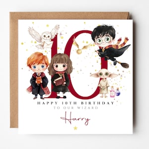 May include: A birthday card featuring illustrations of characters from a popular fantasy series. The card has the number 10 in burgundy, with the text "Happy 10th Birthday to our Wizard Harry". The card is on a brown envelope.