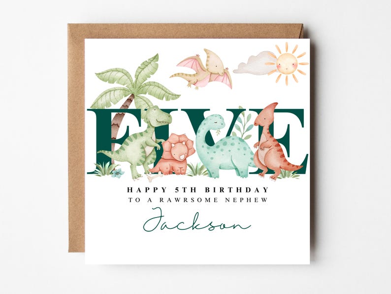 May include: A birthday card with a brown envelope. The card features the word "FIVE" in dark green, with watercolor dinosaurs and a sun illustration. Text reads "Happy 5th Birthday to a rawsome nephew" and a name.