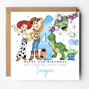 May include: A birthday card featuring Toy Story characters: Woody, Jessie, Buzz Lightyear, Rex, and an alien. The number 4 is prominent, with text reading "Happy 4th Birthday to a special little girl" and a name. The card is on a brown background.