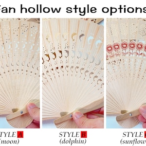May include: Wooden hand fans with intricate cut-out designs. Style A features moon and star cutouts, Style B has dolphin cutouts, and Style C showcases a sunflower pattern. The text "Fan hollow style options" and style names are visible.