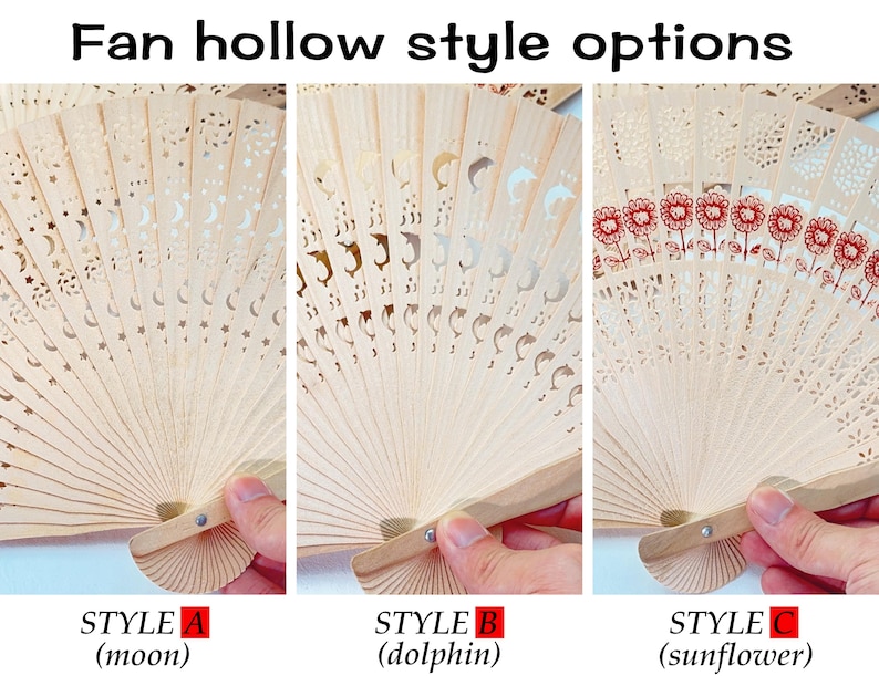 May include: Wooden hand fans with intricate cut-out designs. Style A features moon and star cutouts, Style B has dolphin cutouts, and Style C showcases a sunflower pattern. The text "Fan hollow style options" and style names are visible.