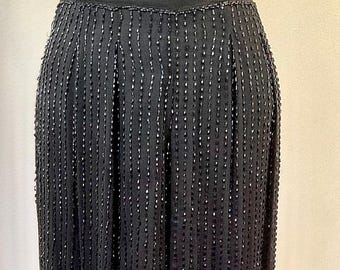 Pantalones negros de seda con cuentas de los años 90 de Sho Max Originals. Talla M, cremallera lateral.