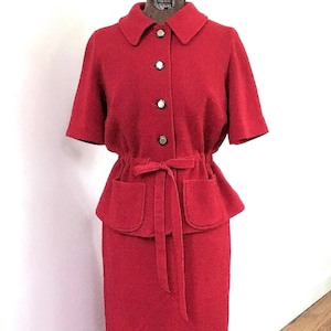 60’s red Kimberly knit skirt set.  Tie adjustable waist short sleeve cardigan, elastic waist A-line skirt. Union label. Pockets  Vintage 14
