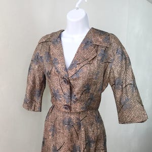 50s print silk suit with cropped jacket and vintage rhinestone buttons.