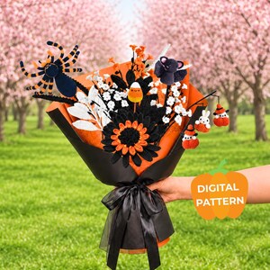 May include: A crochet bouquet featuring a black and orange spider, a bat, a candy corn, and small white flowers wrapped in black and orange paper with a black ribbon. The bouquet includes small hanging figures and a digital pattern pumpkin icon.