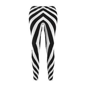 May include: Black and white striped leggings with a geometric pattern.