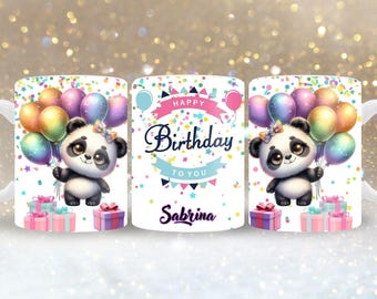 May include: White ceramic mug featuring a cartoon panda holding colorful balloons and gifts. The mug has the text "Happy Birthday To You" and the name "Sabrina". The design includes pink, blue, and yellow accents.