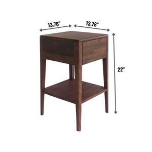 Nightstand Tom Handmade American Walnut Nightstand with dimensions 22” high and 13.78” wide, crafted from solid walnut wood. This compact bedside table features a soft-close drawer and lower shelf, designed with clean modern lines and timeless craftsmanship. A versatile handmade walnut furniture piece perfect for mid-century, minimalist, or contemporary bedroom décor.