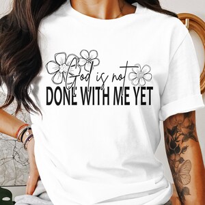 Christian T-Shirt God Is Not Done With Me Yet Inspirational Quote Tee Faith Based Top