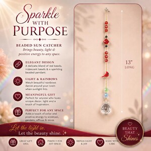 May include: A 13-inch long beaded sun catcher featuring a vertical arrangement of red, green, and blue beads on a gold chain, accented with a small red bird figure and a clear, multifaceted crystal pendant at the bottom, displayed on a card.