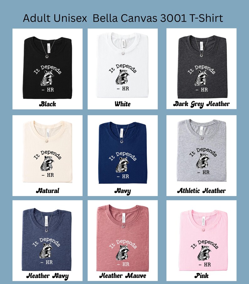 May include: A collection of Bella Canvas 3001 t-shirts in various colors, including black, white, and navy. Each shirt features the phrase "It Depends" with a raccoon graphic and "- HR" below. The shirts are displayed with a necklace.