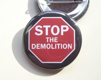 Red STOP THE DEMOLITION stop sign lapel pin (1.5")