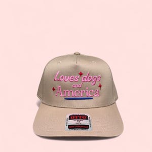 Loves Dogs and America Hat, Patriotic Dog Mom Hat, USA Trucker Hat, Dog Lover Gift, Funny Summer Hat, Fourth of July Hat, American Dog Mom