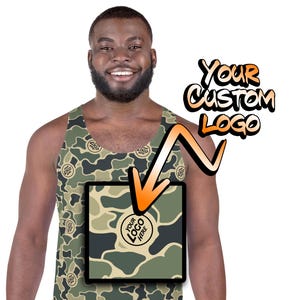 May include: A sleeveless tank top with a camouflage pattern. The tank top has a space for a custom logo to be added. The text "YOUR CUSTOM LOGO" is written in orange on a white background.