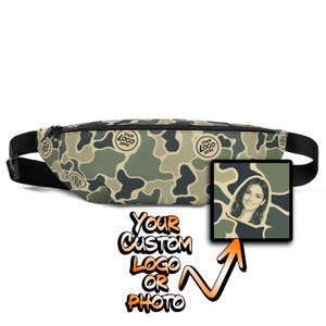 May include: A fanny pack featuring a green, tan, and dark gray camouflage pattern with multiple circular "YOUR LOGO HERE" text prints. A square inset shows a portrait of a person against the same camouflage background with an orange arrow pointing to it.