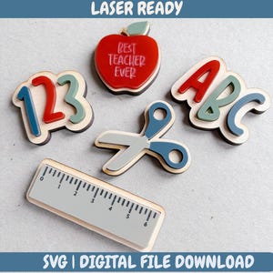 May include: A collection of laser-cut wooden school-themed shapes. Includes a red apple with "Best Teacher Ever" text, numbers 123, ABC letters, scissors, and a ruler. The words "Laser Ready" and "SVG | DIGITAL FILE DOWNLOAD" are also visible.