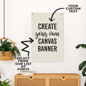 May include: A white canvas banner with black text that reads "CREATE your own CANVAS BANNER".  Arrows point to the text and indicate that you can select from a list of fonts and add your own custom text.