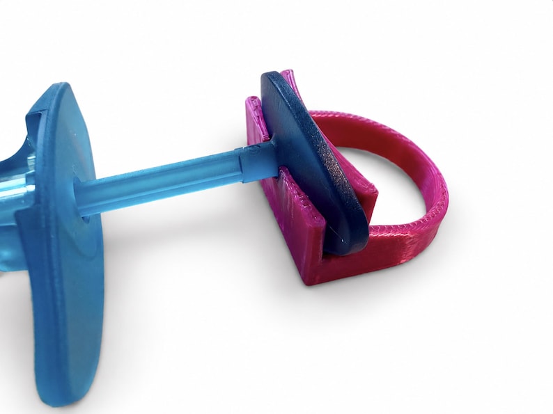 Evolysse aspiration ring in magenta silk