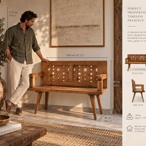 May include: A wooden bench with a backrest featuring a geometric cutout pattern, armrests, and four angled legs. The bench measures 120 cm (47.2 inches) in length, 89 cm (35 inches) in height, and 46 cm (18.1 inches) in depth, weighing approximately 50 kg (110 lb).