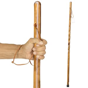 May include: A wooden walking stick with a smooth, rounded top and a leather strap. The stick is a light brown color with a natural wood grain. A second walking stick is also shown, with a twisted design and a black rubber tip.