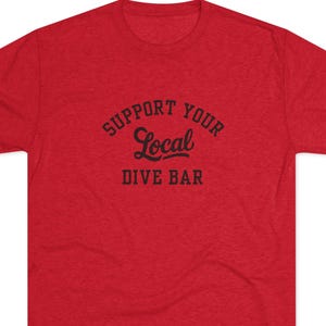 Apoya tu camiseta de bar de buceo local