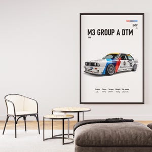 May include: A framed poster showing a BMW M3 Group A DTM race car from 1989. The car is white with blue, red, and yellow details. The poster includes technical specifications and the BMW logo.