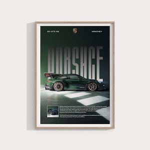 May include: A framed print showcasing a dark green Porsche 911 GT3 RS. The word "PORSCHE" is displayed in large, silver lettering. The print includes the Porsche logo and the text "Manthey".