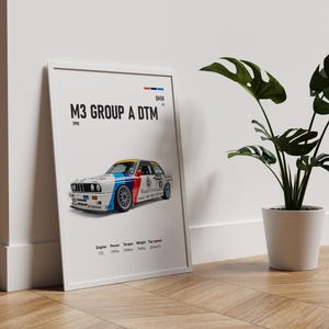 May include: A framed poster of a BMW M3 Group A DTM race car. The car is white with blue, red, and yellow details. The poster includes the car's specifications and the text "M3 GROUP A DTM 1995". A potted plant is next to the poster.