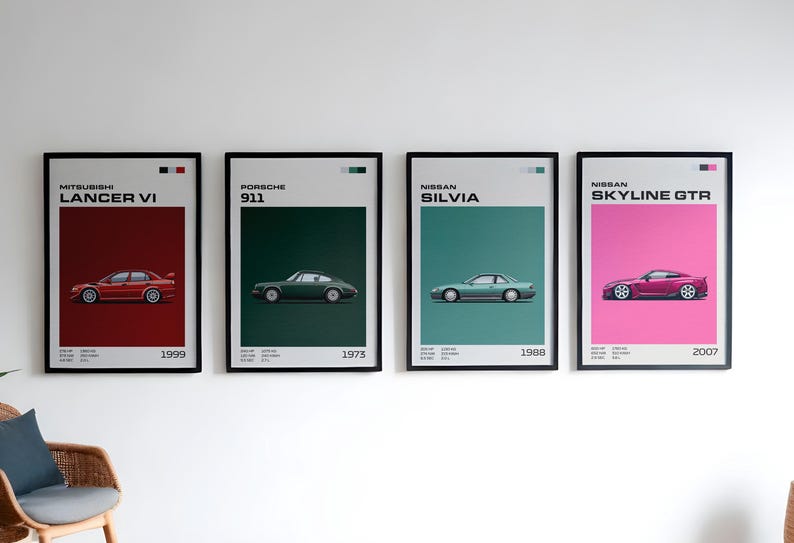 May include: Four framed car posters. The posters feature illustrations of a Mitsubishi Lancer VI, Porsche 911, Nissan Silvia, and Nissan Skyline GTR. Each poster has the car's name, year, and a colored background. The Mitsubishi is red, the Porsche is green, the Nissan Silvia is teal, and the Nissan Skyline GTR is pink.