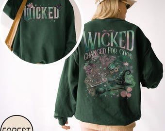 Camiseta retro de la película Wicked, cómoda y de dos caras, regalo para fans del Mago de Oz, camiseta rosa y verde de bruja, camiseta con gráficos de la cultura pop del musical Wicked.