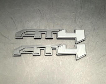 Custom Interior Badges for AT4 & AT4X Trucks and SUVs | Glow and Non-Glow Options | Custom Colors | 2 or 4 Piece Sets