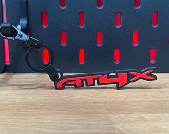 GMC AT4X Logo Keychain (Set of 2) - Glow in the Dark Car Accessories