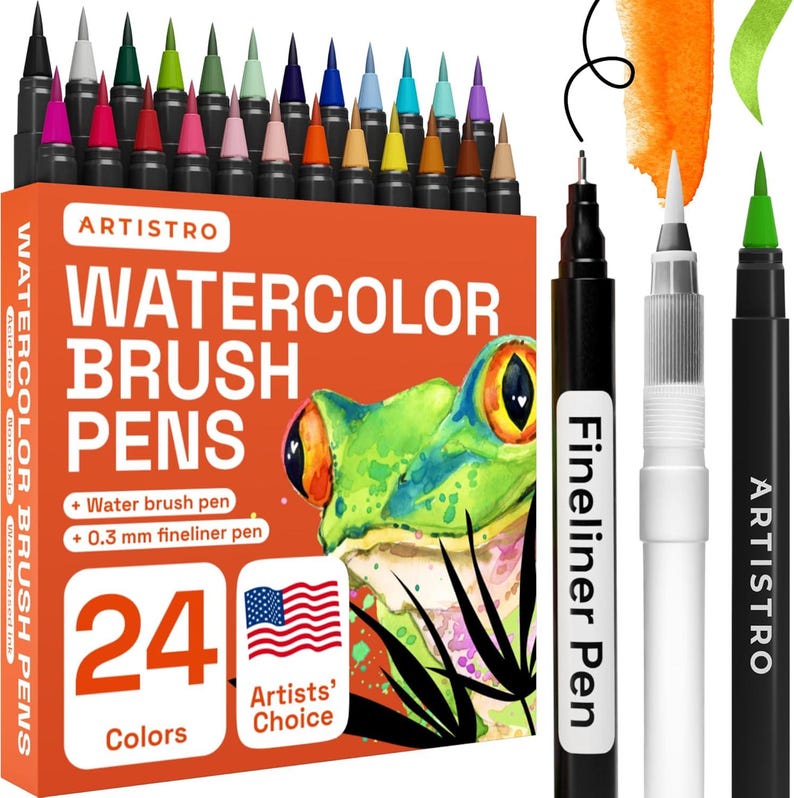 Puede incluir: Un conjunto de 24 rotuladores de pincel de acuarela y dos rotuladores de punta fina. Los rotuladores est&aacute;n dispuestos en una caja con una ilustraci&oacute;n de rana y el texto "ARTISTRO WATERCOLOR BRUSH PENS 24 Colores Elecci&oacute;n del artista".