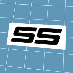May include: A white rectangular sticker featuring the black letters "SS" in a bold, sans-serif font. The sticker is displayed against a light blue grid background.
