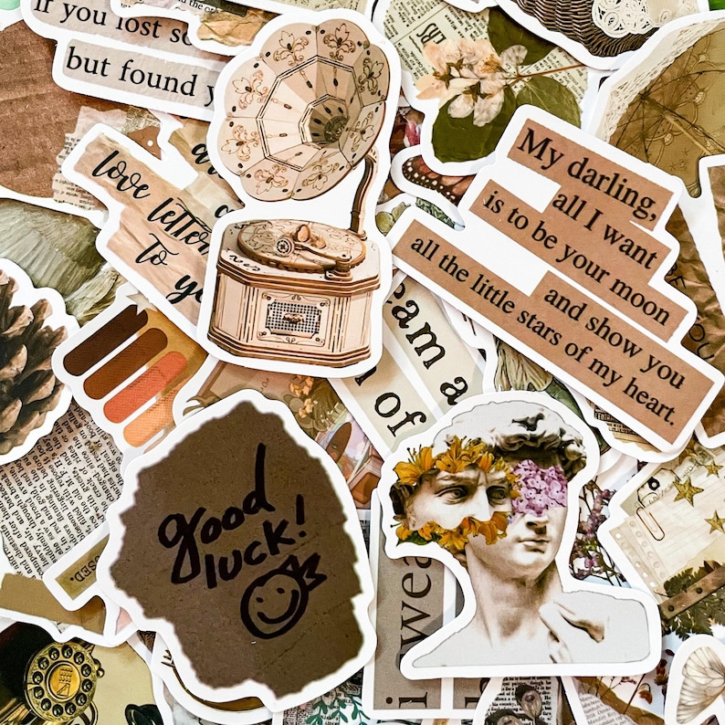 May include: A collection of vintage-style stickers with various designs. Includes a sticker of a gramophone, a statue, and text that reads "Good luck!" and "My darling, all I want is to be your moon and show you all the little stars of my heart."