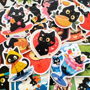 May include: A collection of colorful stickers featuring cartoon black cats in various poses. Some cats are on skateboards, holding flowers, or wearing raincoats. Other stickers include cats with oranges, desserts, and hearts.