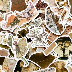 May include: A collection of vintage-style stickers with a variety of designs. The stickers feature floral elements, fairy illustrations, and text fragments. The color palette includes shades of brown, beige, and green, creating a nostalgic aesthetic.