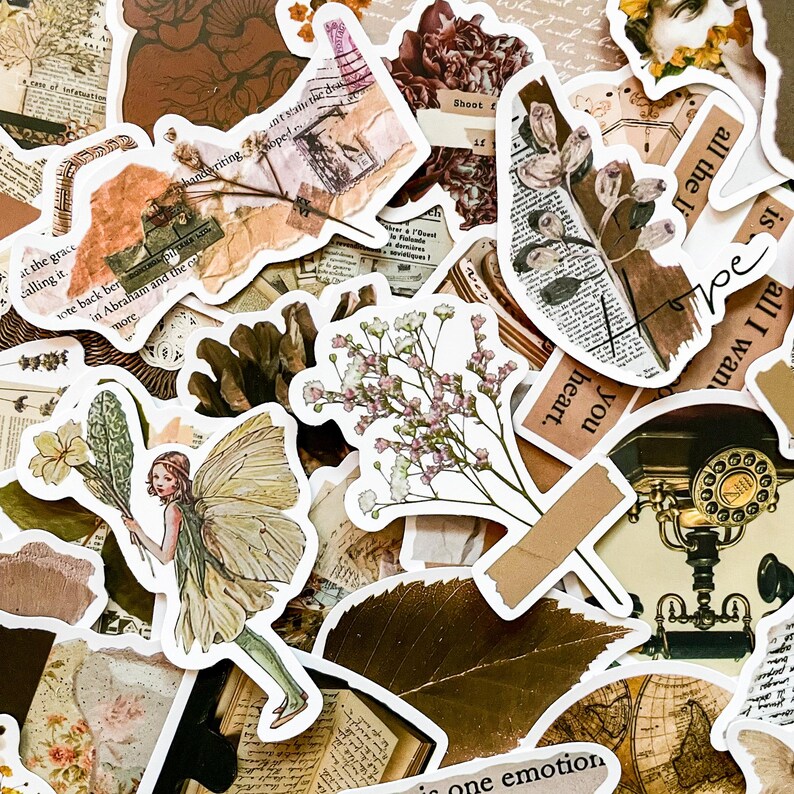 May include: A collection of vintage-style stickers with a variety of designs. The stickers feature floral elements, fairy illustrations, and text fragments. The color palette includes shades of brown, beige, and green, creating a nostalgic aesthetic.