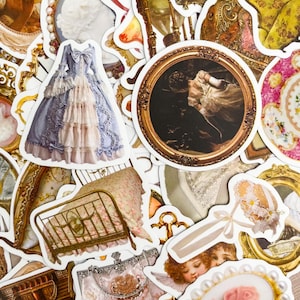 May include: A selection of vintage-style stickers with various designs. The stickers include a blue and pink dress, a framed painting, a bed, and decorative elements. The stickers have a romantic, antique aesthetic.