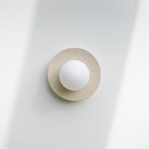 Luna Handmade Ceramic Round Wall Sconce – Speckled White Clay Light for Natural Interiors