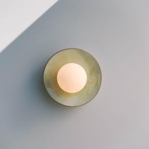 Handmade Ceramic Round Wall Sconce — Soft Green Tones for Calm, Natural Interiors