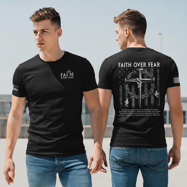 May include: Black t-shirt with the text "FAITH OVER FEAR" on the front and back. The back of the shirt features a cross, crown of thorns, and American flag design. The shirt also has a small American flag on the sleeve.